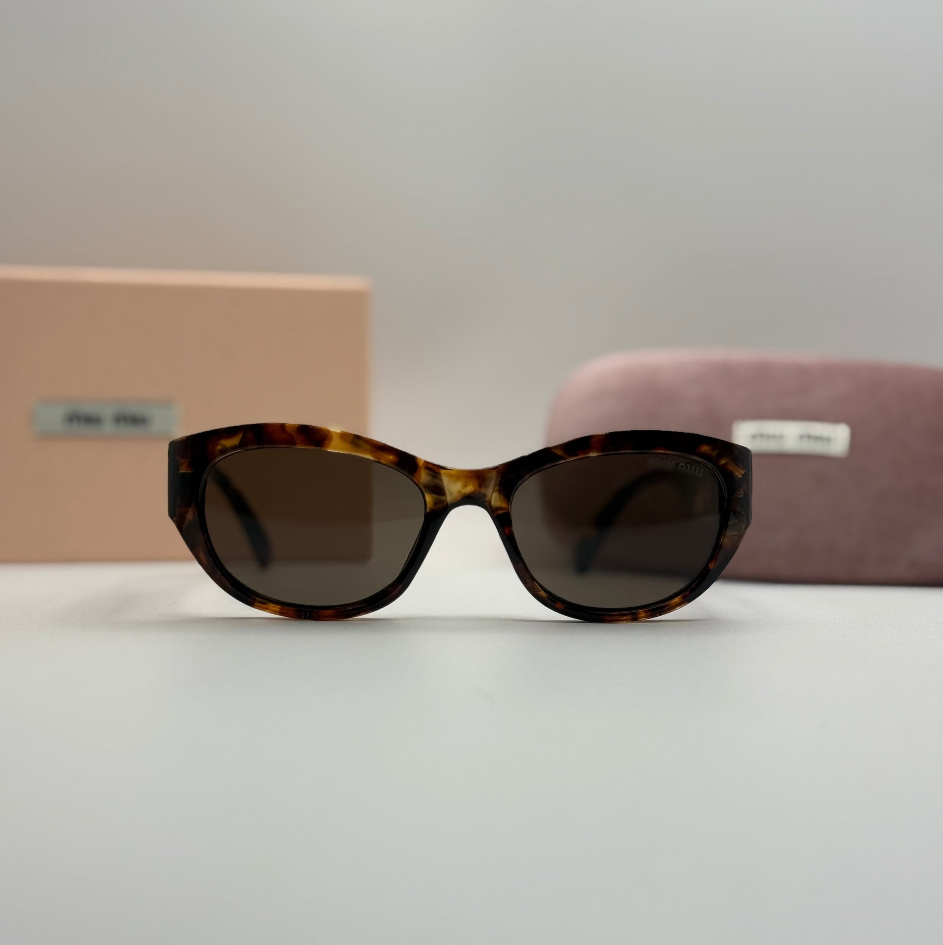 Miu Miu Cat-Eye Sunglasses – Tortoiseshell