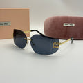 Miu Miu Black Rimless Shield Sunglasses – Gold Logo Edition