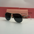 Miu Miu Aviator Sunglasses – Silver Frame / Dark Black Lenses