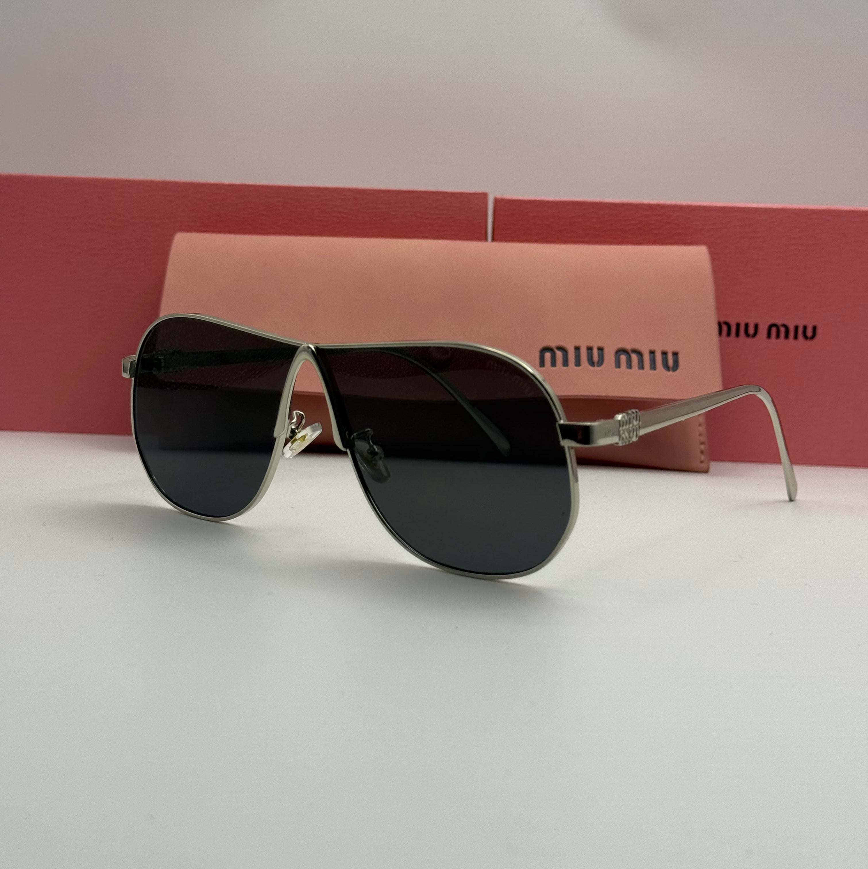 Miu Miu Aviator Sunglasses – Silver Frame / Dark Black Lenses