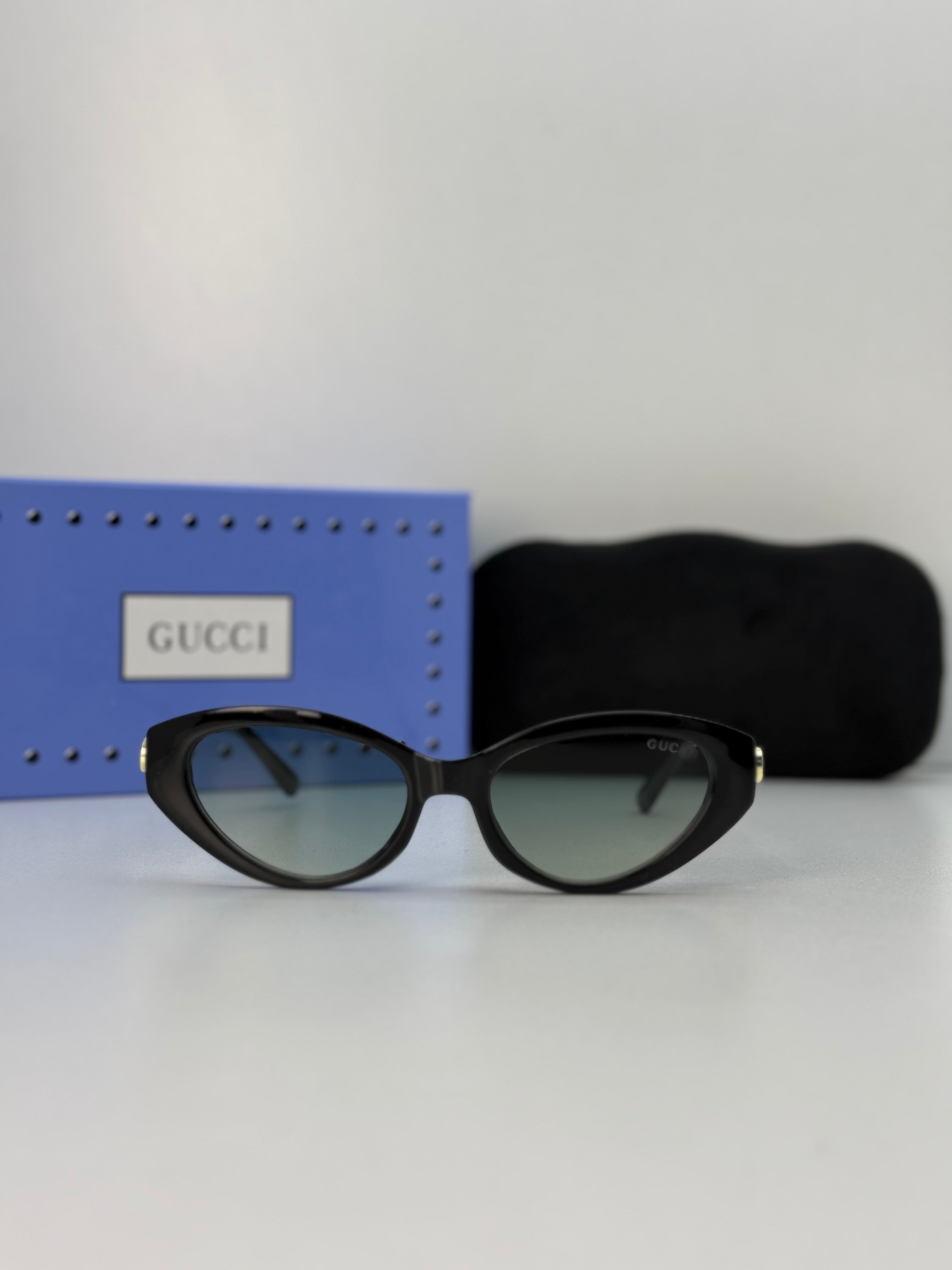 Gucci Cat-Eye Sunglasses — Black / Blue Gradient