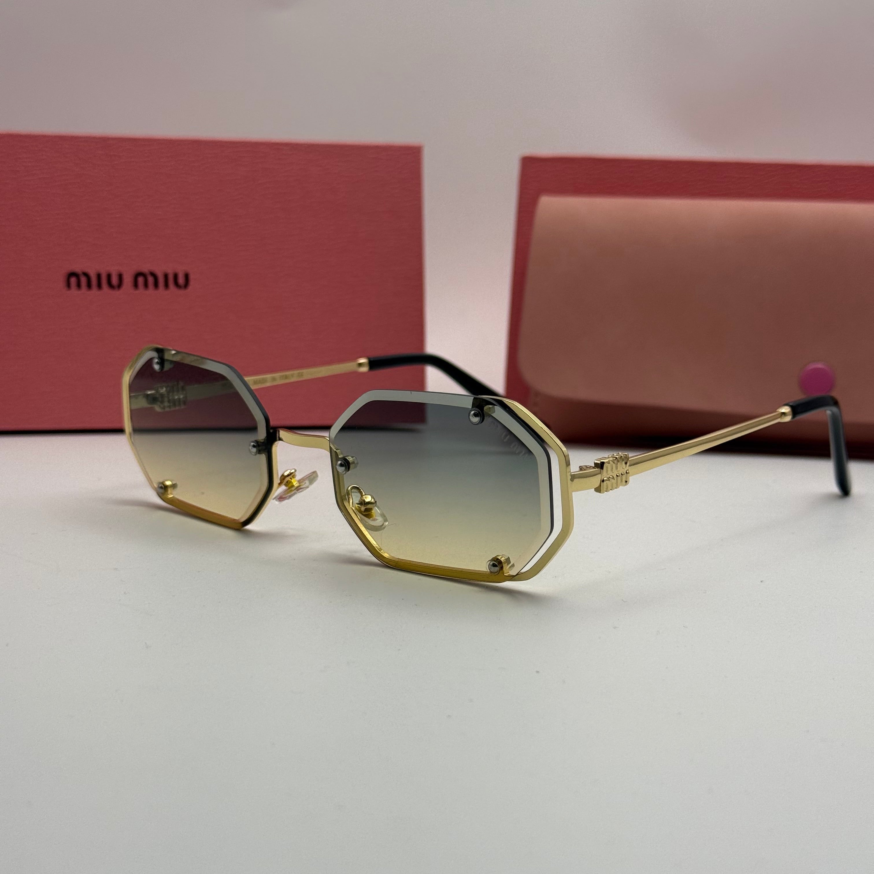 Miu Miu Sunglasses – Gold Rimless Gradient Lenses