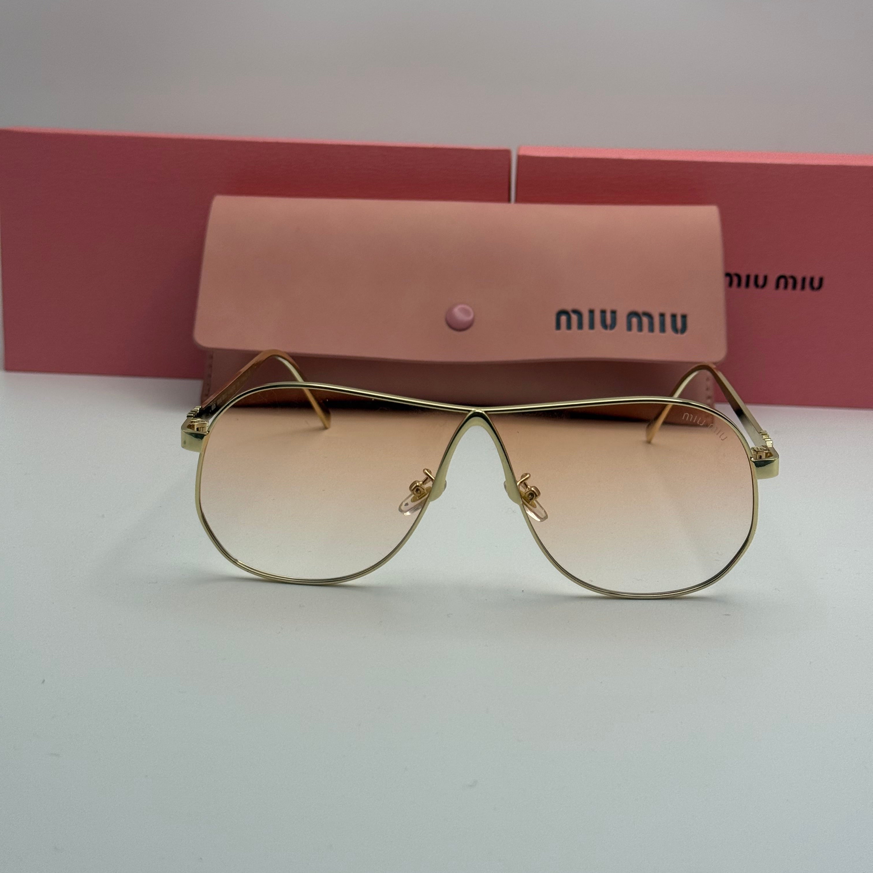 Miu Miu Aviator Sunglasses – Gold Frame / Pink Gradient Lenses