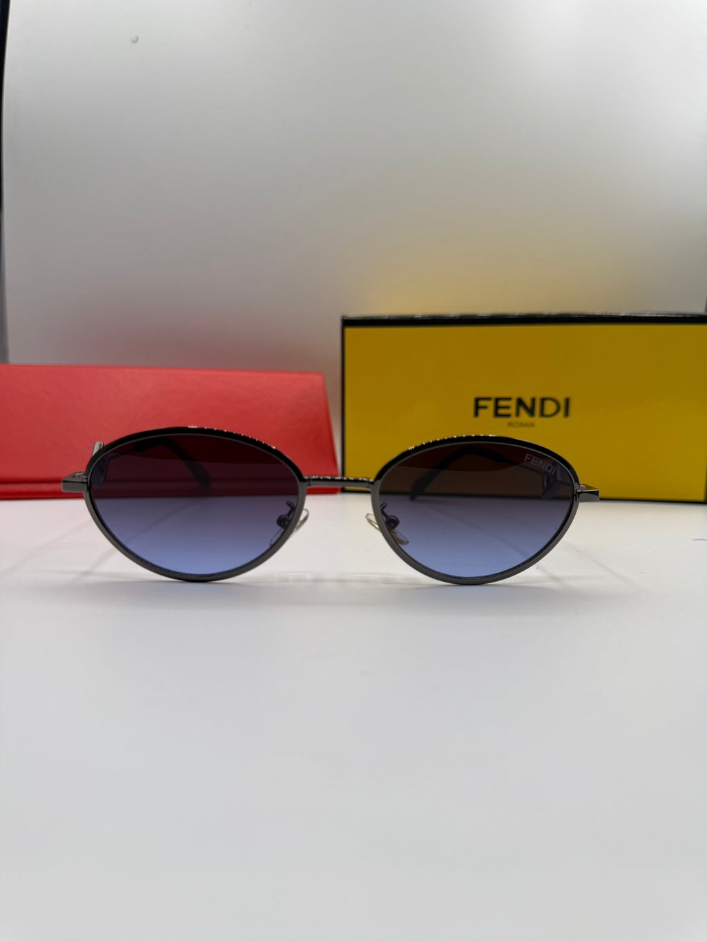 Fendi Round Sunglasses – Black Frame & Gradient Blue Lenses