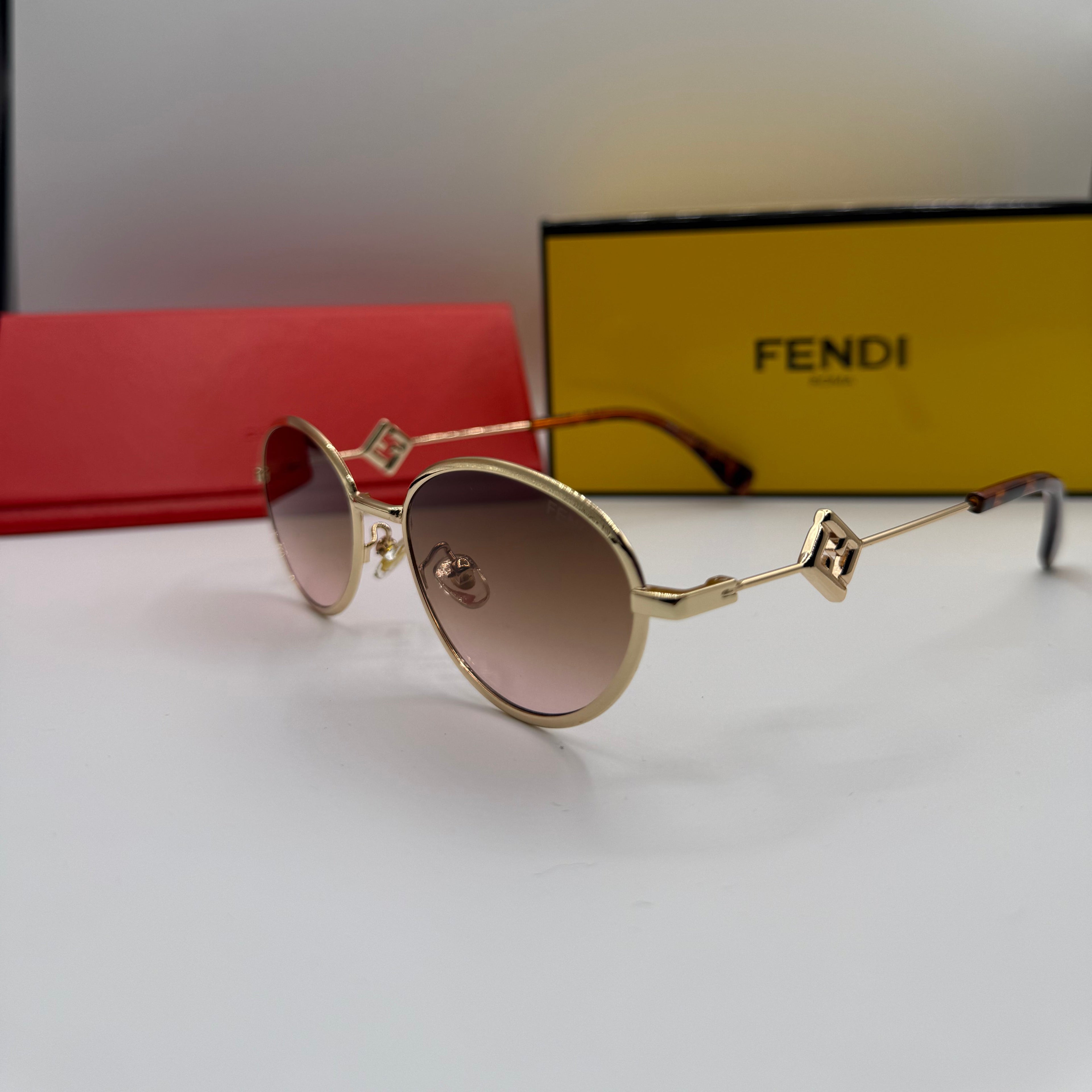 Fendi Round Sunglasses – Gold Frame & Gradient Brown Lenses