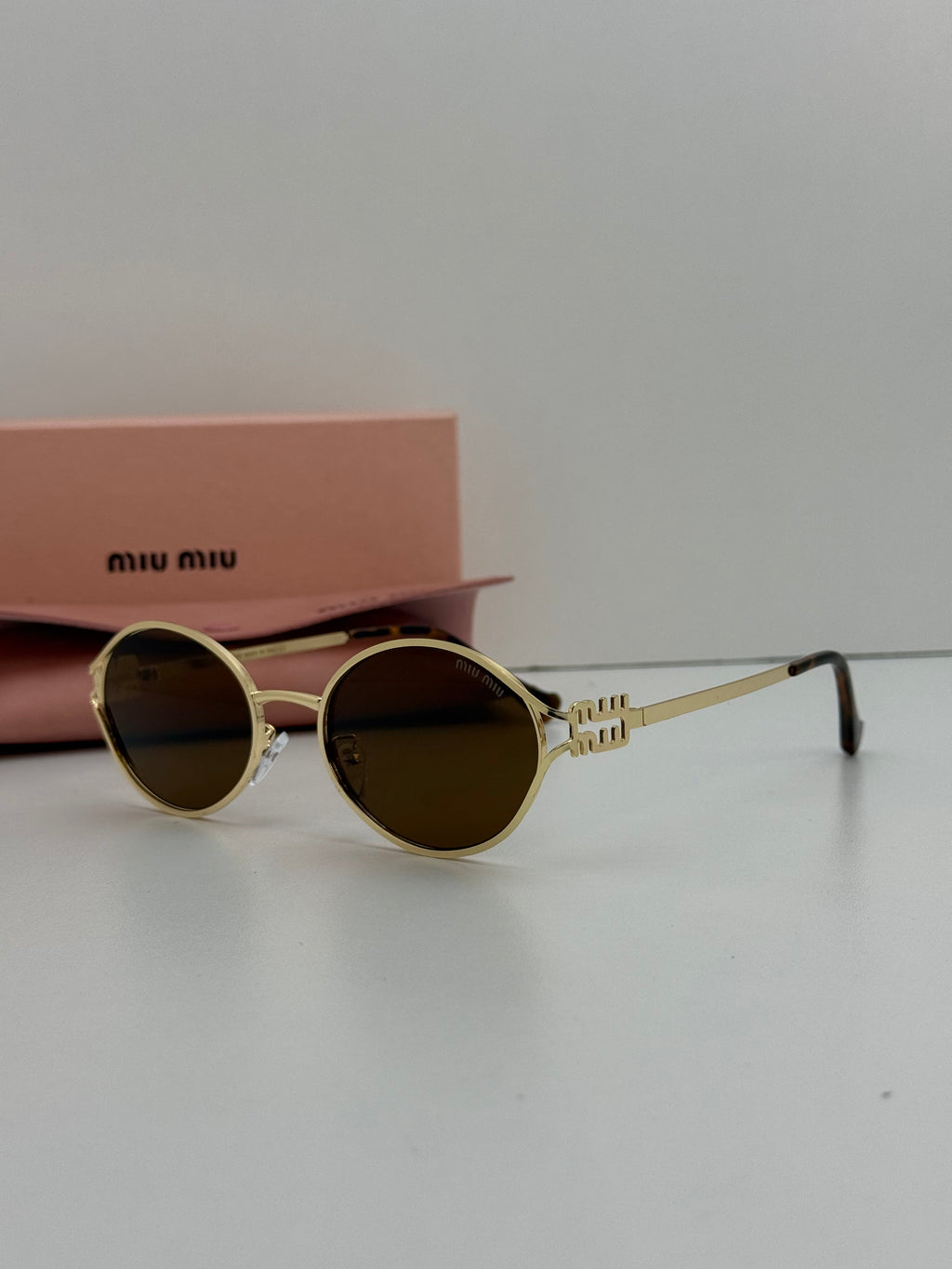 Miu Miu Oval Metal Sunglasses (Gold / Brown)