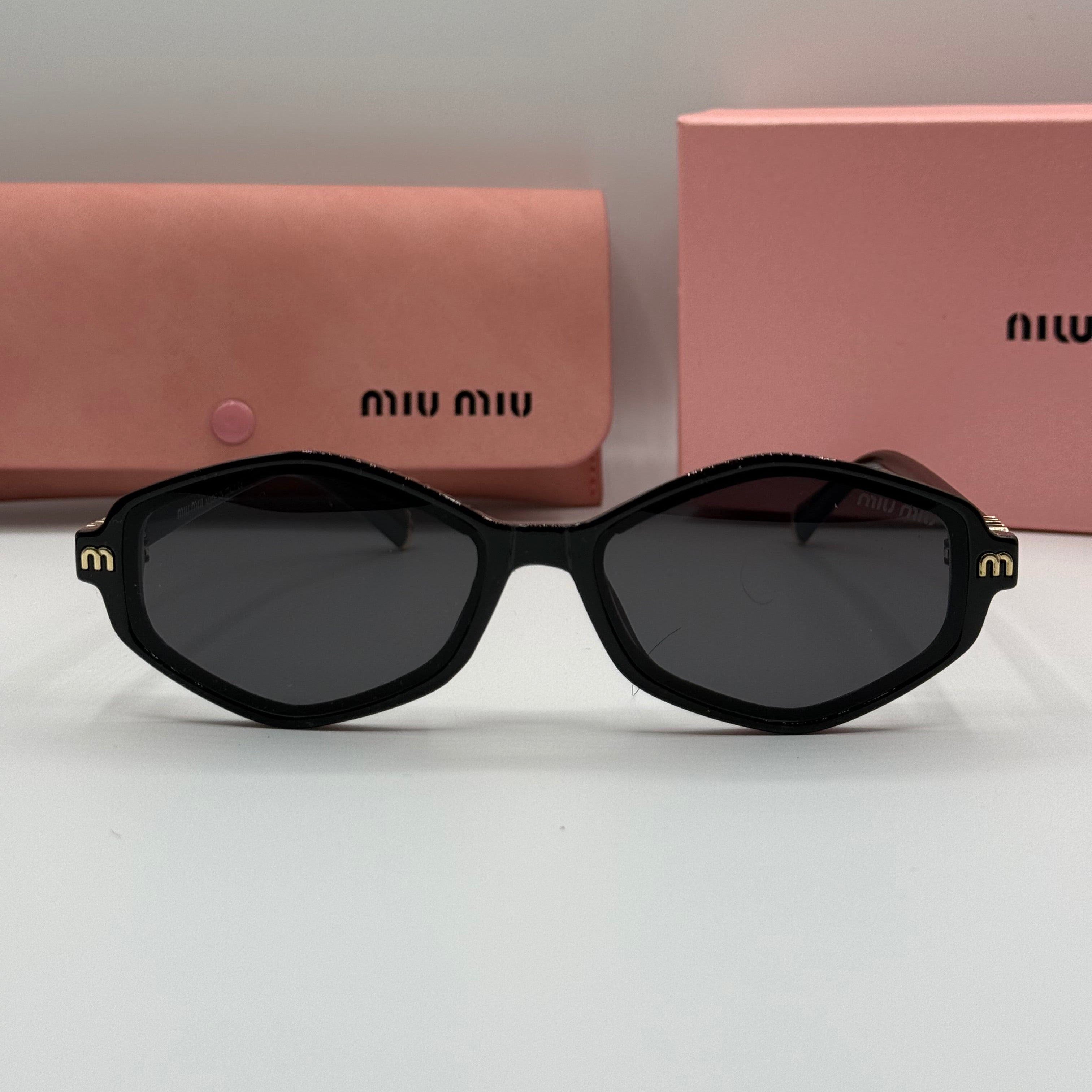 Miu Miu Sunglasses – Black Frame / Dark Lenses