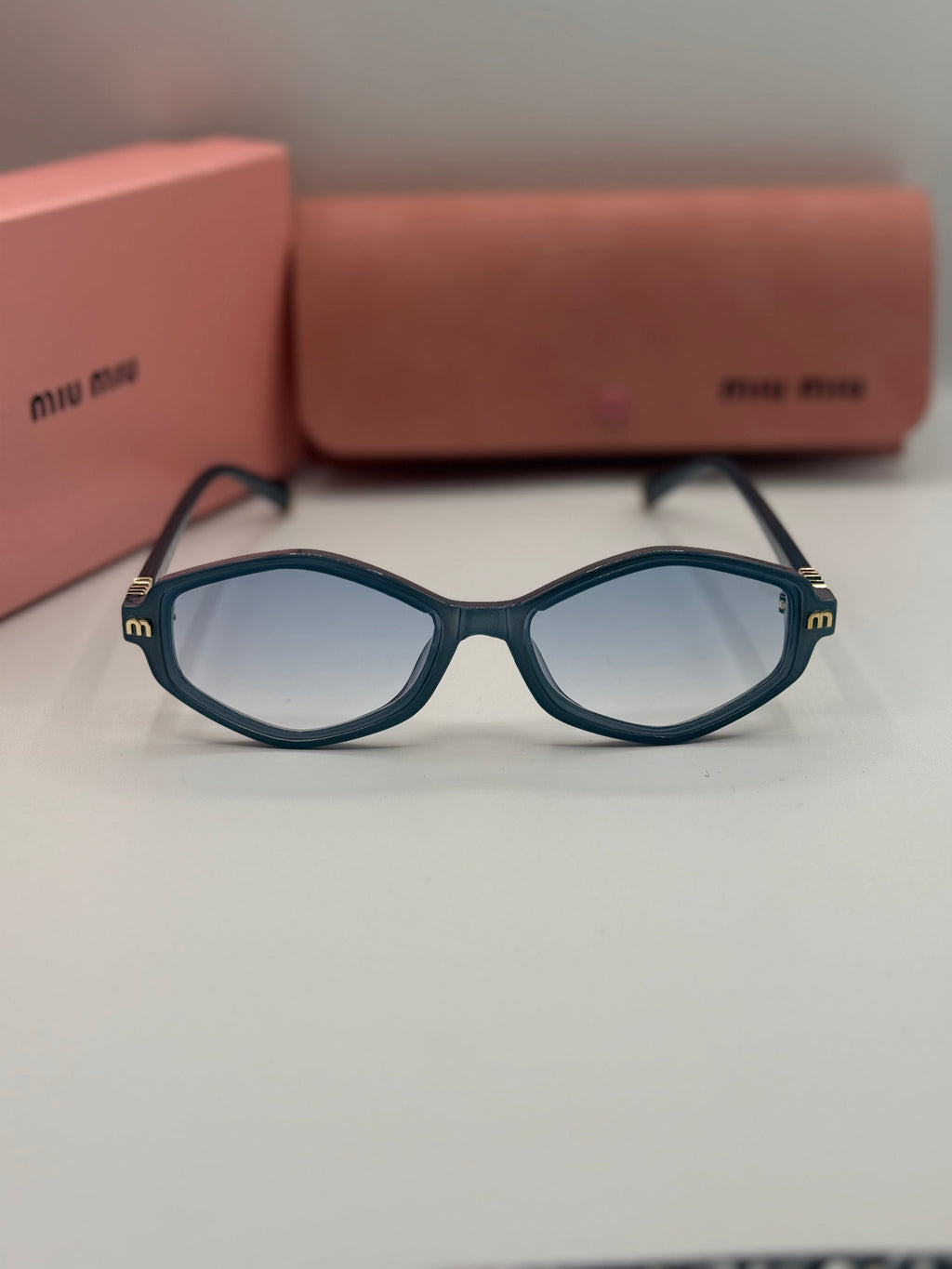 Miu Miu Oval Sunglasses – Teal Blue