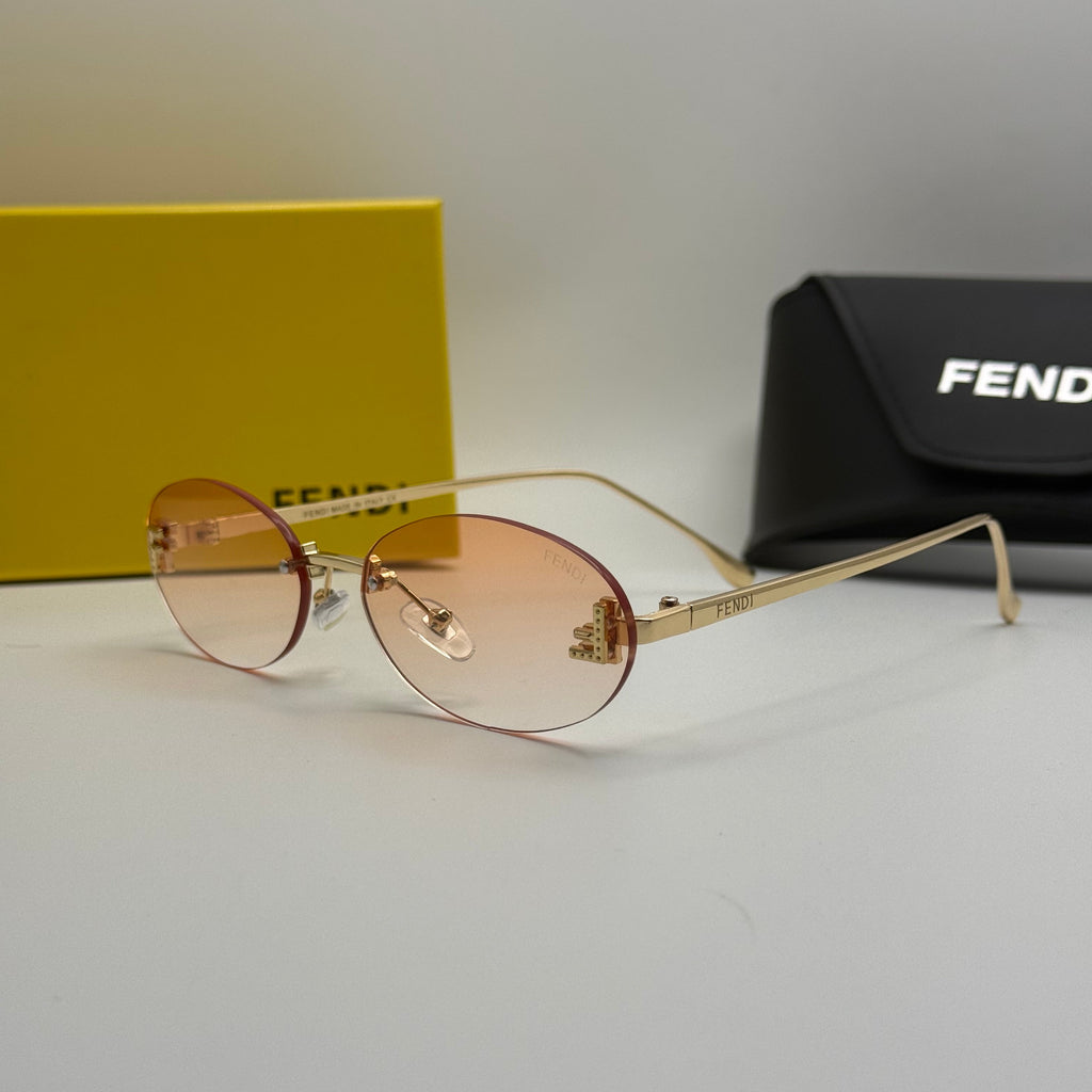 Fendi Rimless Oval Sunglasses – Gold / Peach Gradient