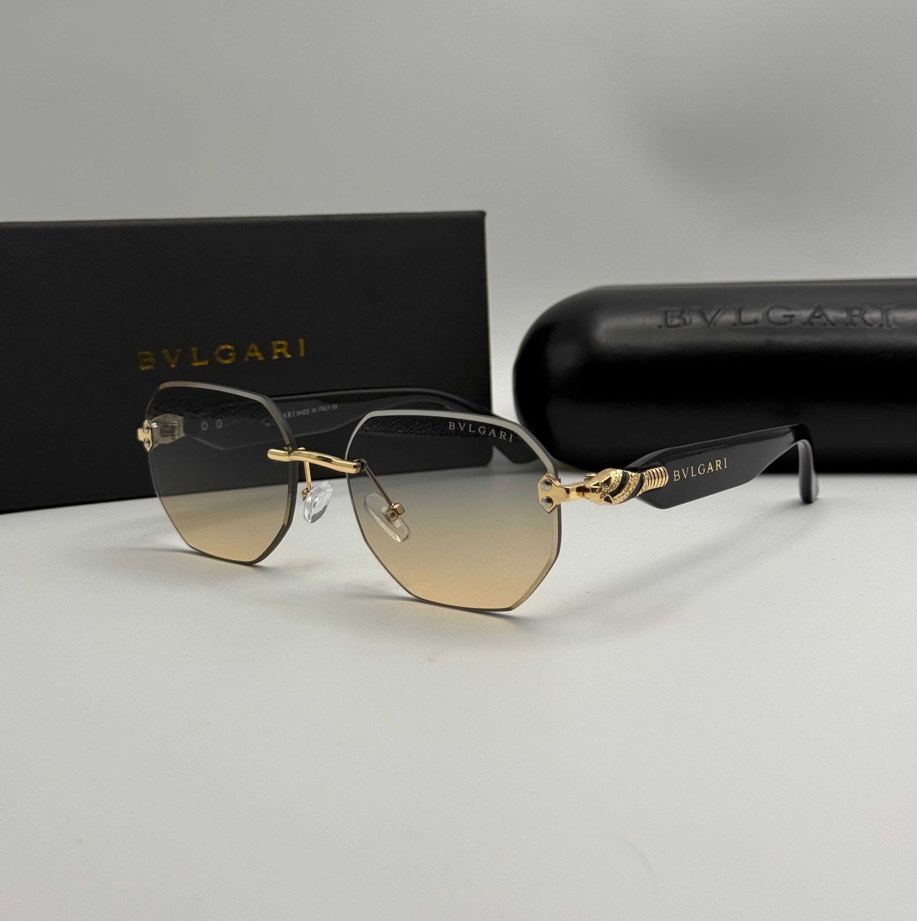 Bvlgari Rimless Geometric Sunglasses – Gold / Blue-Amber Gradient