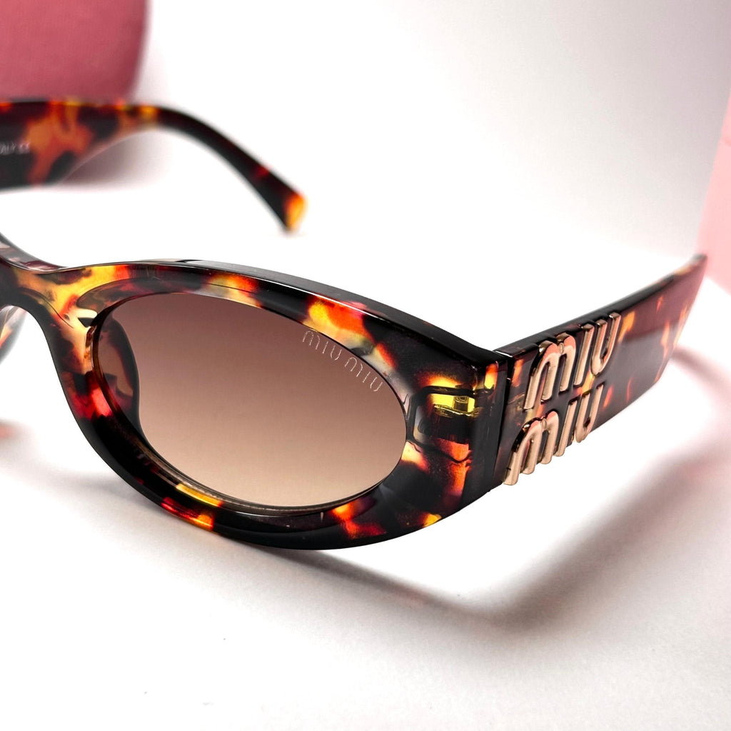 Miu Miu Glimpse Oval – Glamour