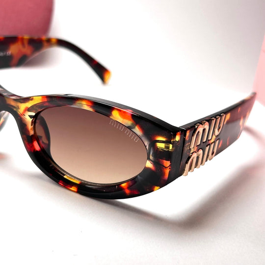 Miu Miu Glimpse Oval – Glamour