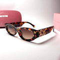 Miu Miu Glimpse Oval – Glamour