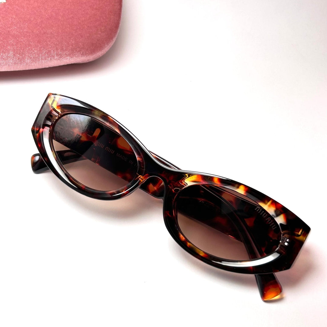 Miu Miu Glimpse Oval – Glamour