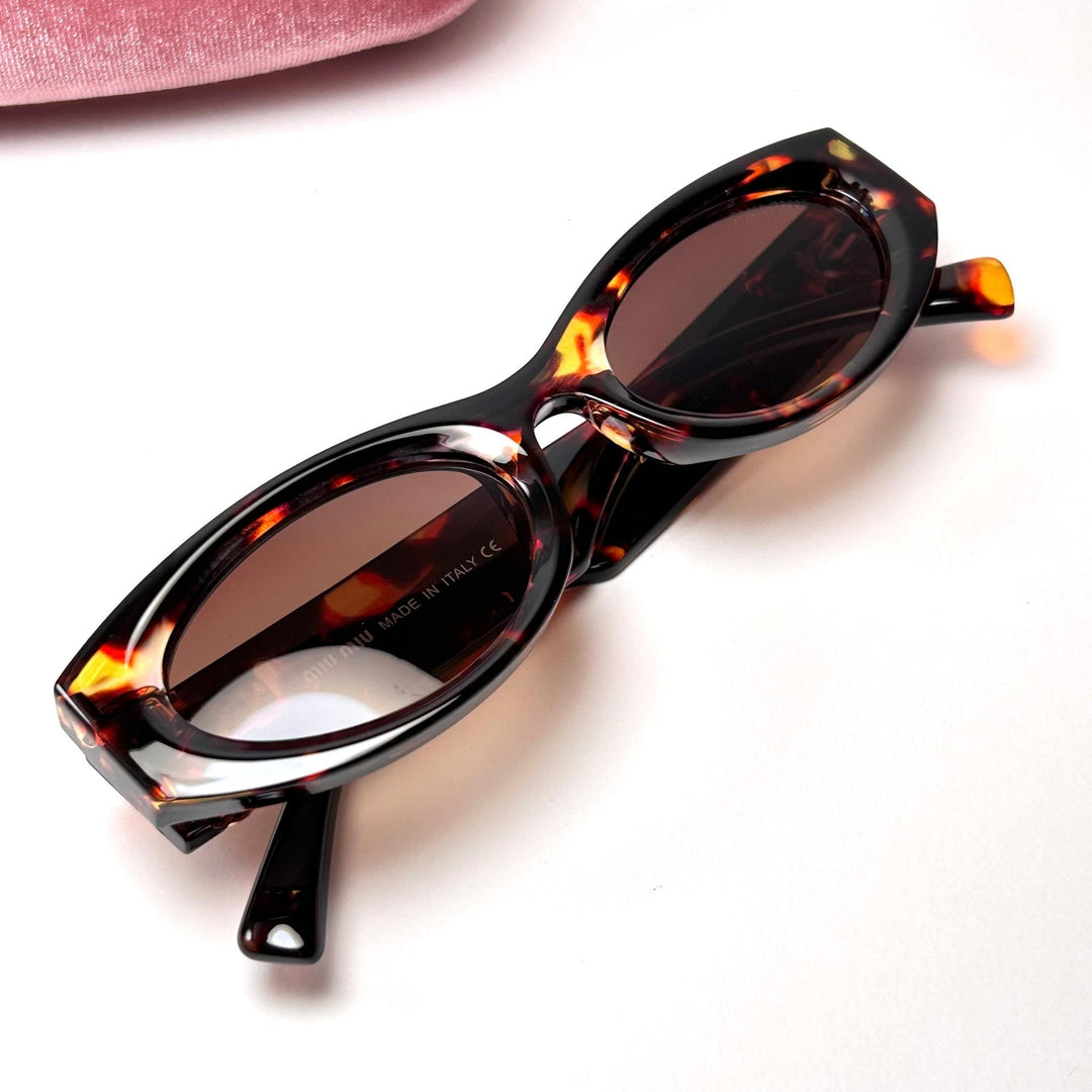 Miu Miu Glimpse Oval – Glamour