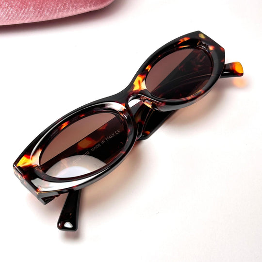 Miu Miu Glimpse Oval – Glamour