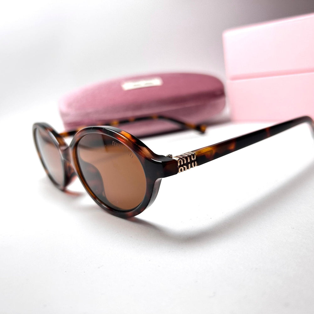 Miu Miu Regard - Tigerl