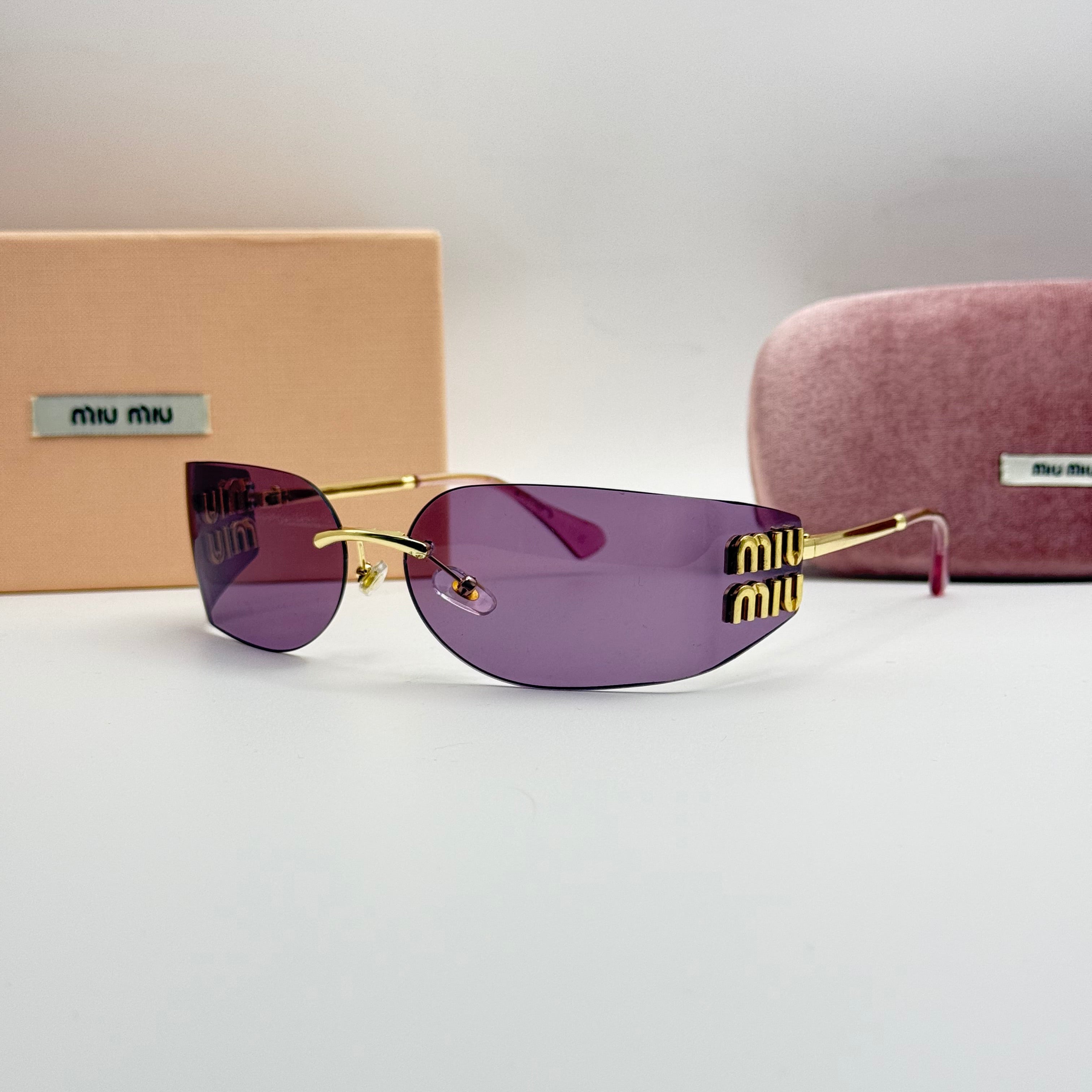Miu Miu Rimless Sunglasses